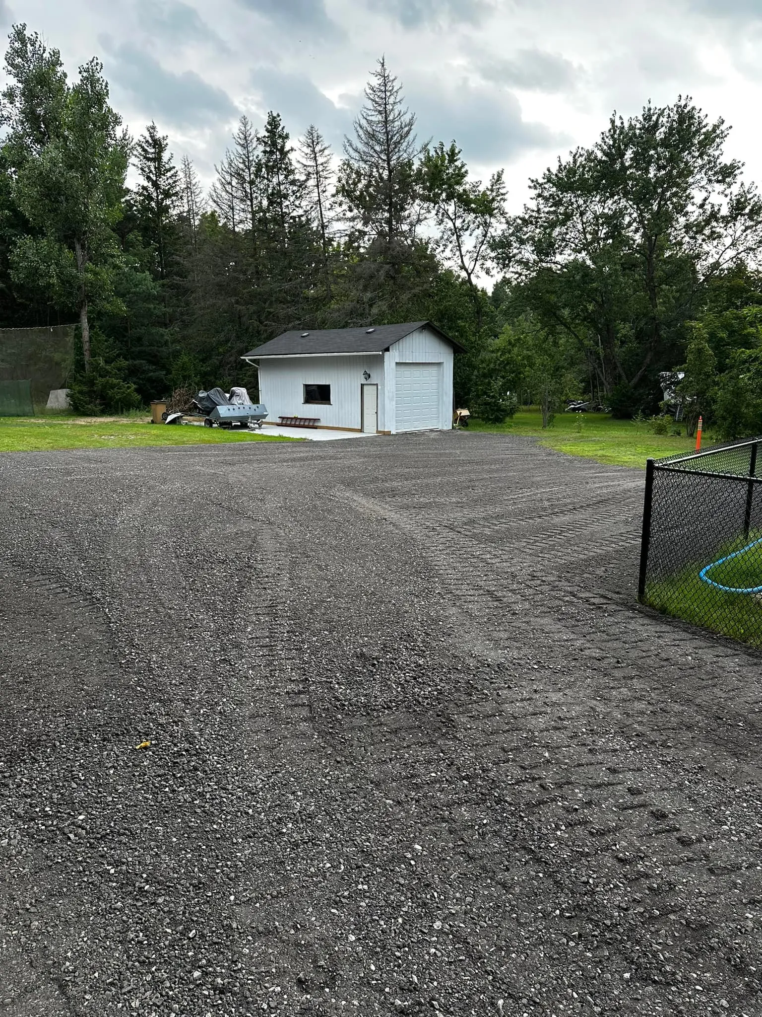 Driveway after grading and resurfacing