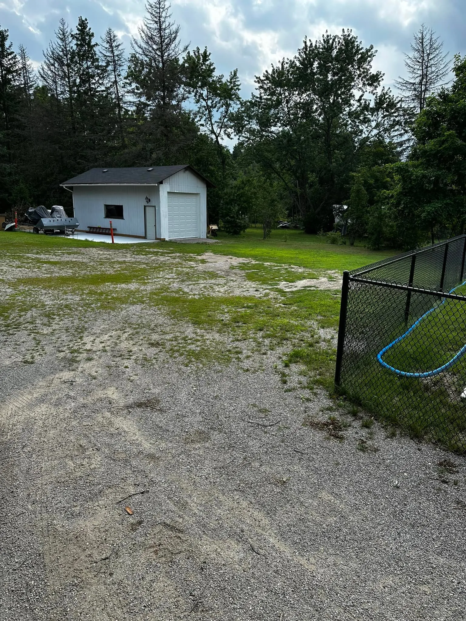 Driveway before grading and resurfacing